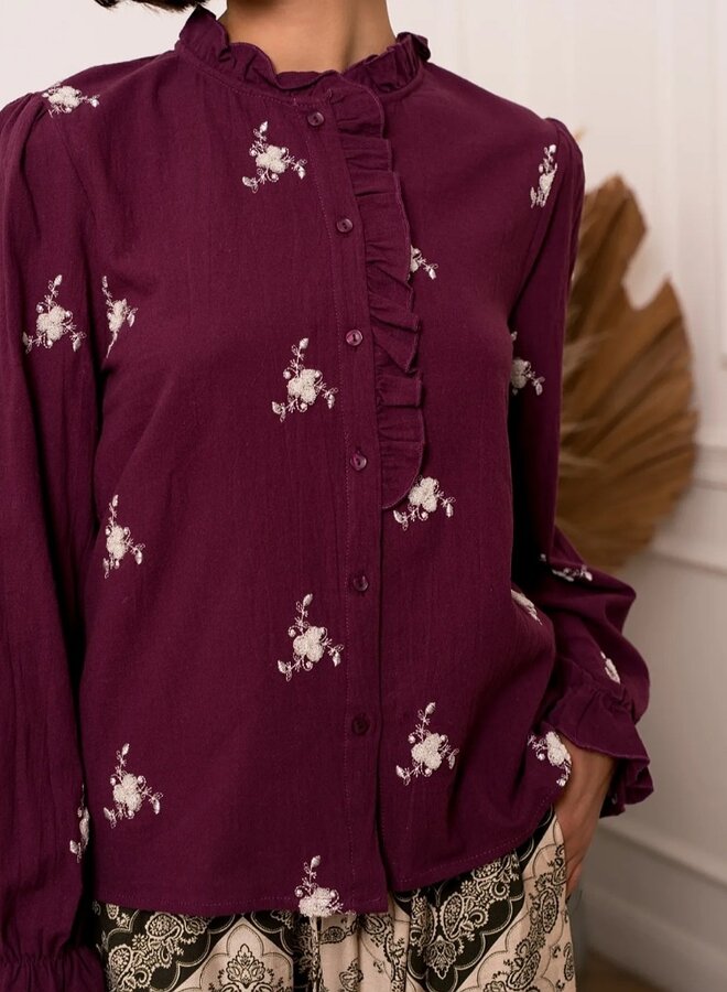 Embroidered ruffle blouse