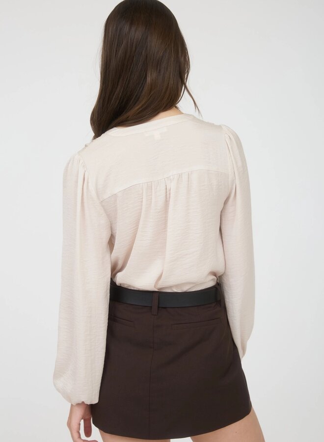 Textured half button long sleeve blouse