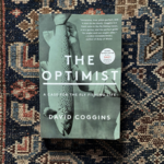 THE OPTIMIST - PAPERBACK BOOK - DAVID COGGINS