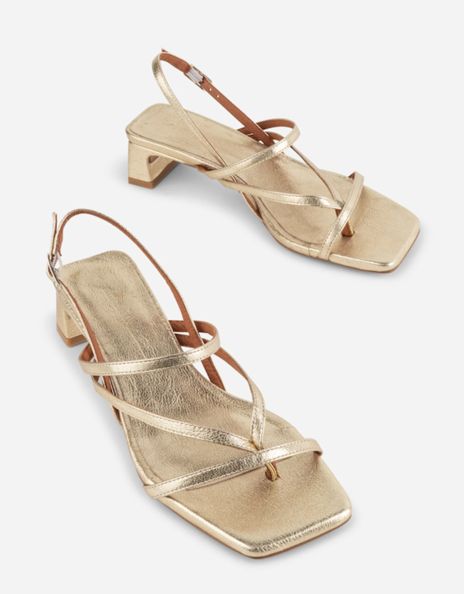 INTENTIONALLY BLANK PUP STRAPPY HEEL