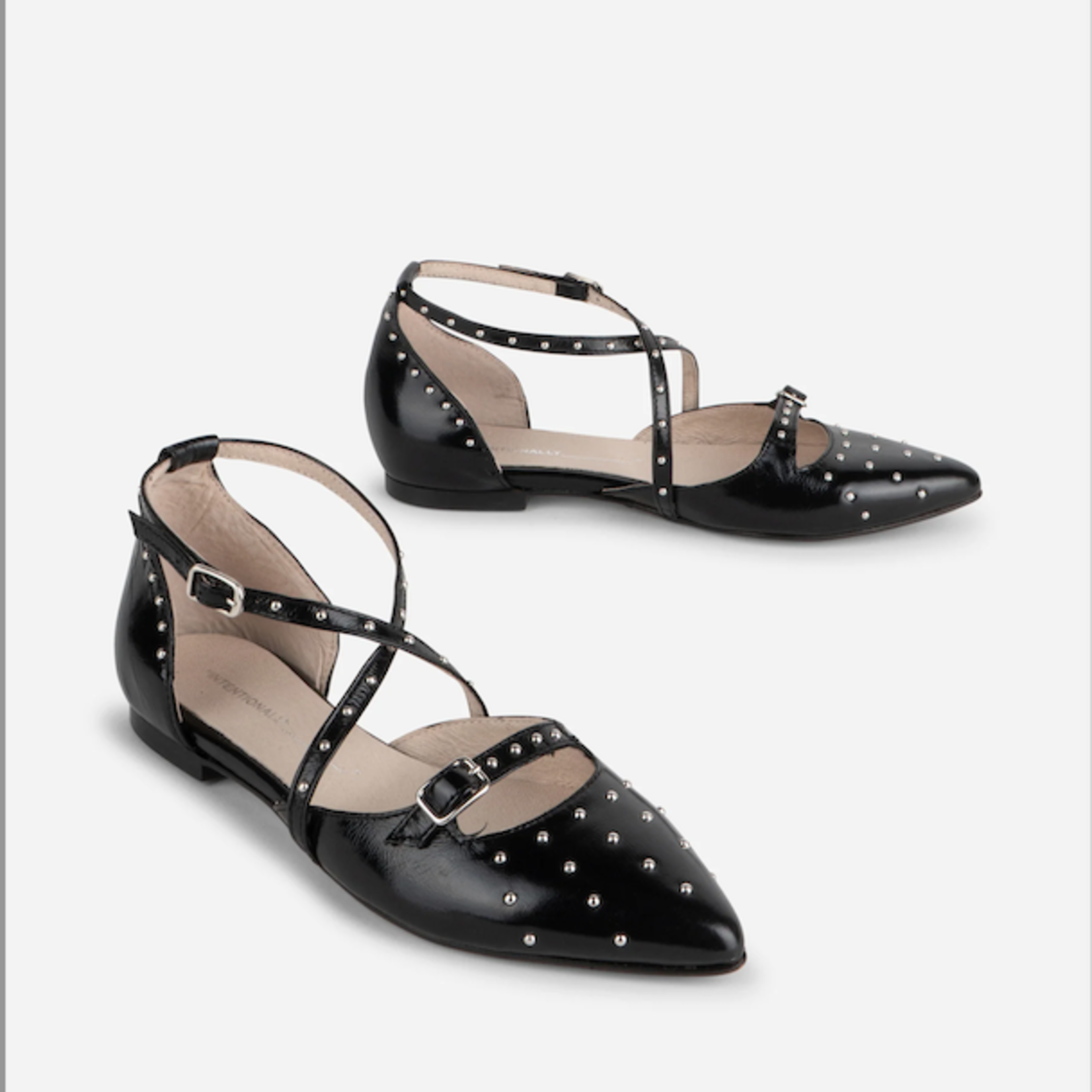 INTENTIONALLY BLANK CROWD STUDDED FLAT