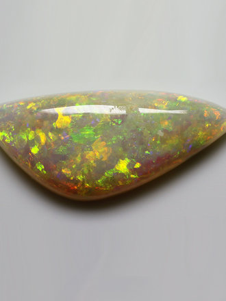3.52ct freeshape Green & Orange Mintabie White Opal Cabochon 3.52ct freeshape Green & Orange Mintabie White Opal Cabochon