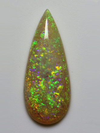 3.35ct freeshape Green/Orange Mintabie White Opal Cabochon 3.35ct freeshape Green/Orange Mintabie White Opal Cabochon