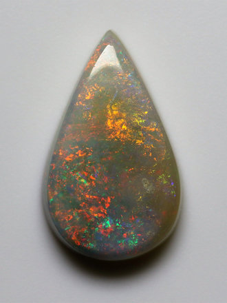 3.11ct freeshape Orange/Multi Mintabie Black Cabochon 3.11ct freeshape Orange/Multi Mintabie Black Cabochon