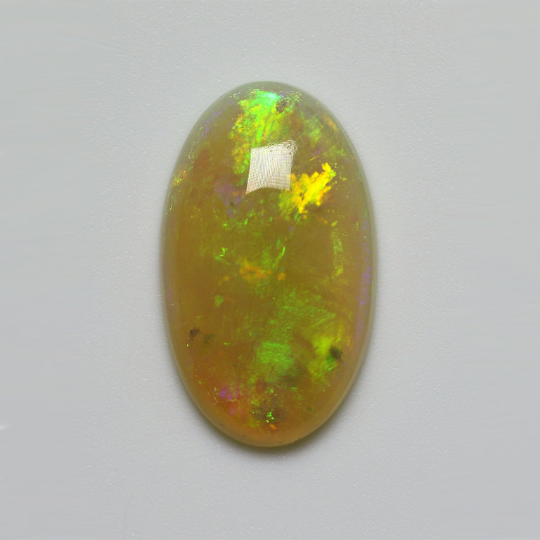 2.35ct freeshape Green Mintabie White Opal Cabochon