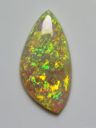 2.08ct freeshape Green/Orange Mintabie White Opal Cabochon 2.08ct freeshape Green/Orange Mintabie White Opal Cabochon