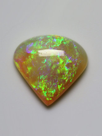 2.87ct freeshape Green & Orange Mintabie White Opal Cabochon 2.87ct freeshape Green & Orange Mintabie White Opal Cabochon
