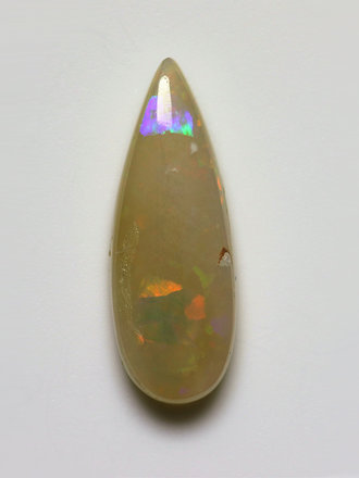 1.79ct freeshape Green & Orange Mintabie White Opal Cabochon 1.79ct freeshape Green & Orange Mintabie White Opal Cabochon