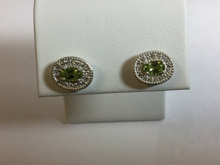 Sterling Silver Peridot & 1/8 CTW Diamond Halo-Style Earrings