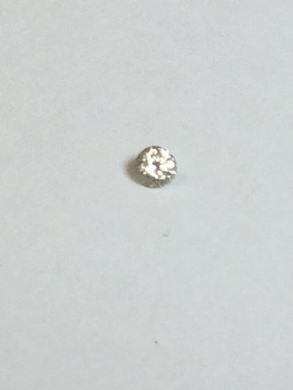 .09 ct round diamond SI1-SI2 2.8mm