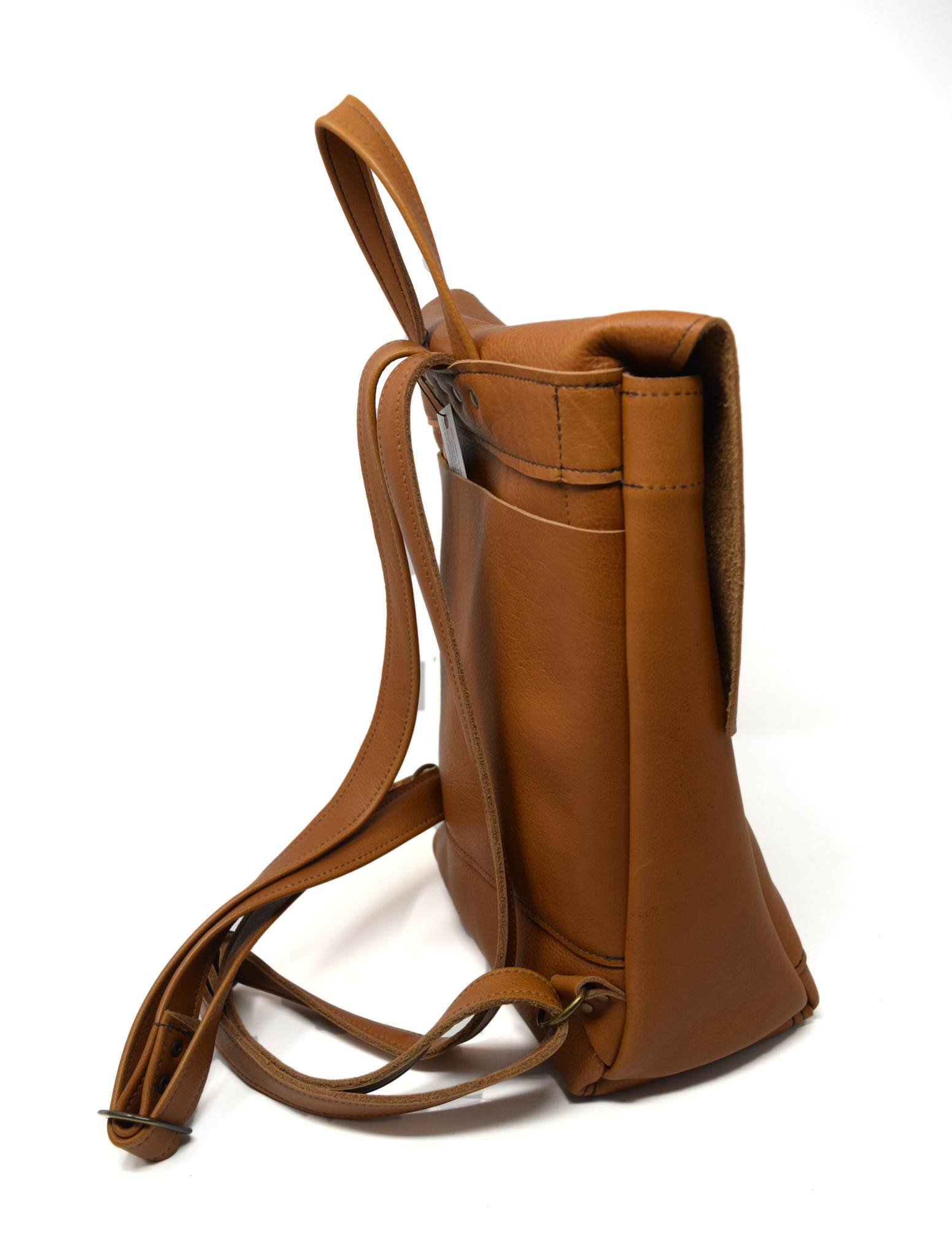 small tan leather backpack