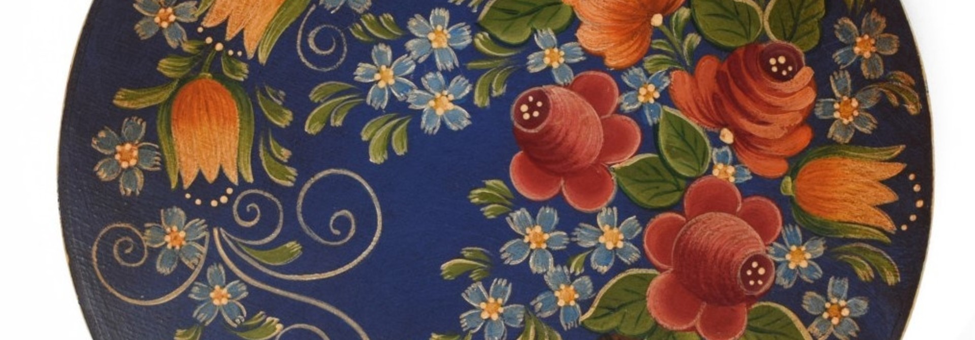 Round box deep blue purple with cornucopia of flowers