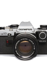 Olympus Olympus OM10 35mm SLR Camera w/50mm f1.8 Lens & Manual Adapter