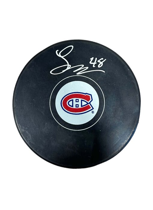 Lane Hutson Autographed Puck - Logo