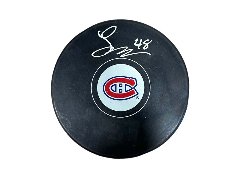 Lane Hutson Autographed Puck - Logo