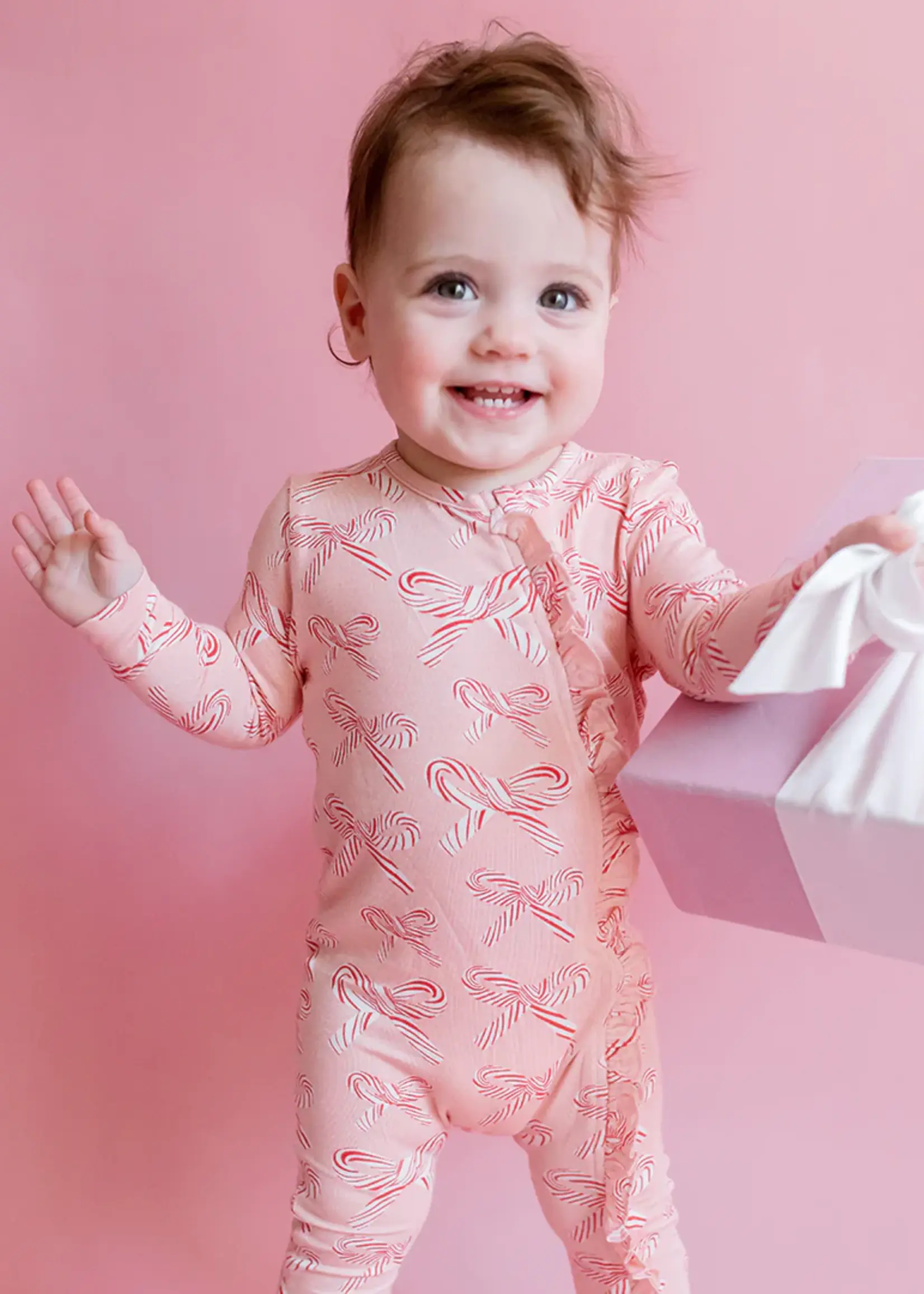 Pink Chicken baby ruffle bamboo romper - candy cane bows
