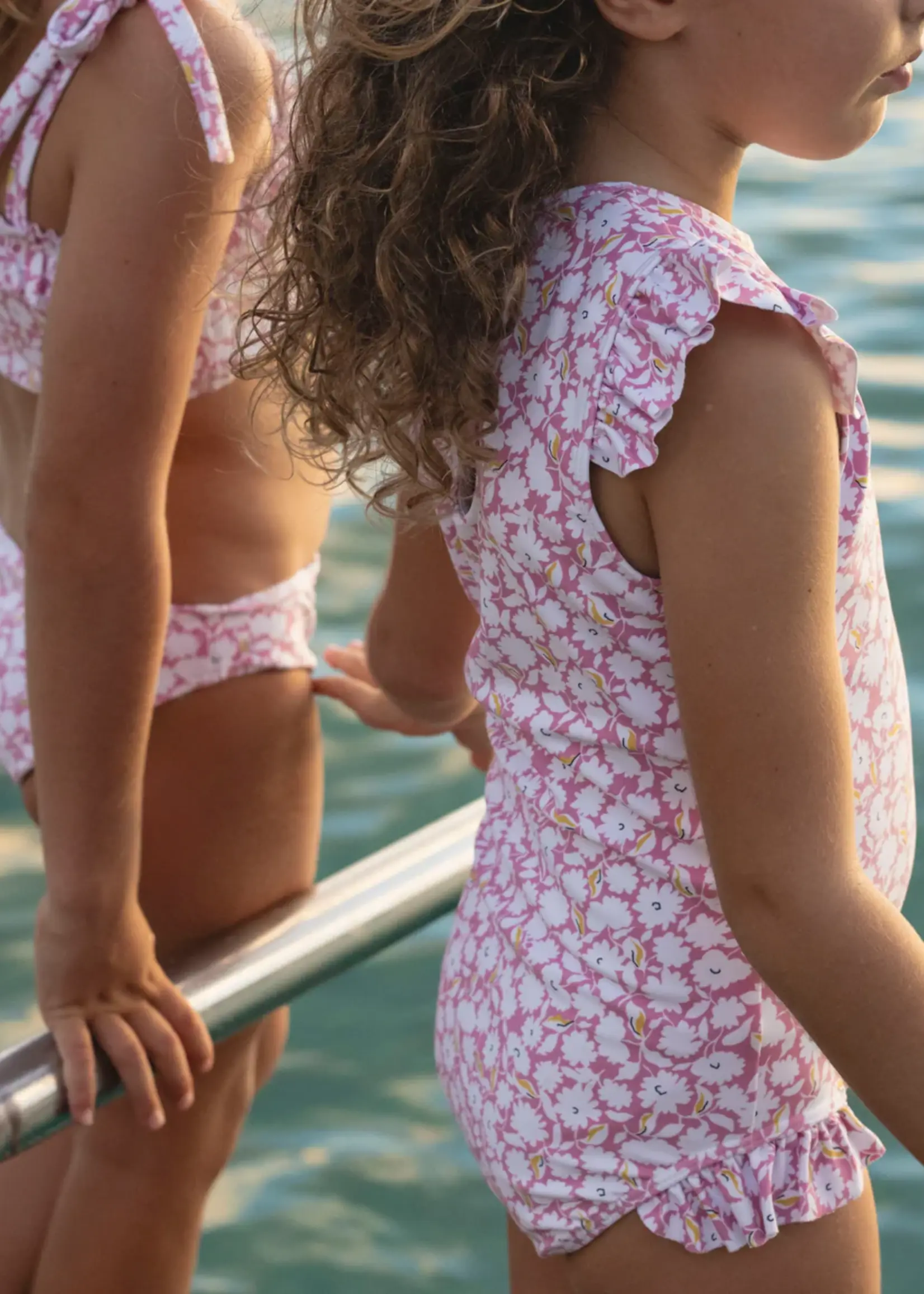 Minnow ruffle cap sleeve rashguard one piece