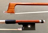 H. DELILLE violin bow, round Pernambuco stick with ebony & silver mounted frog