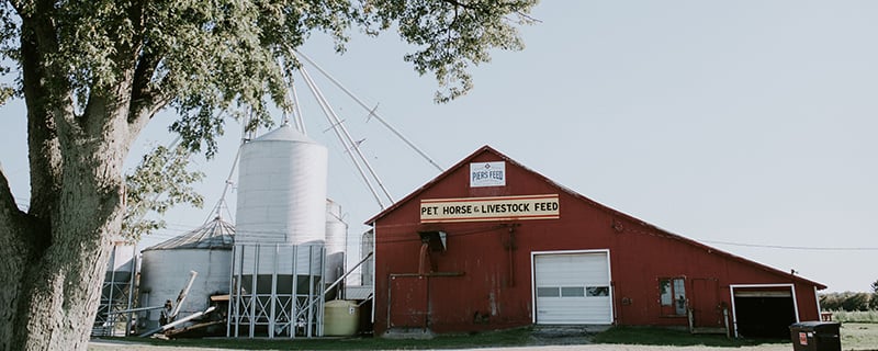 Contact us Banner image, piers feed and country store photo front of building