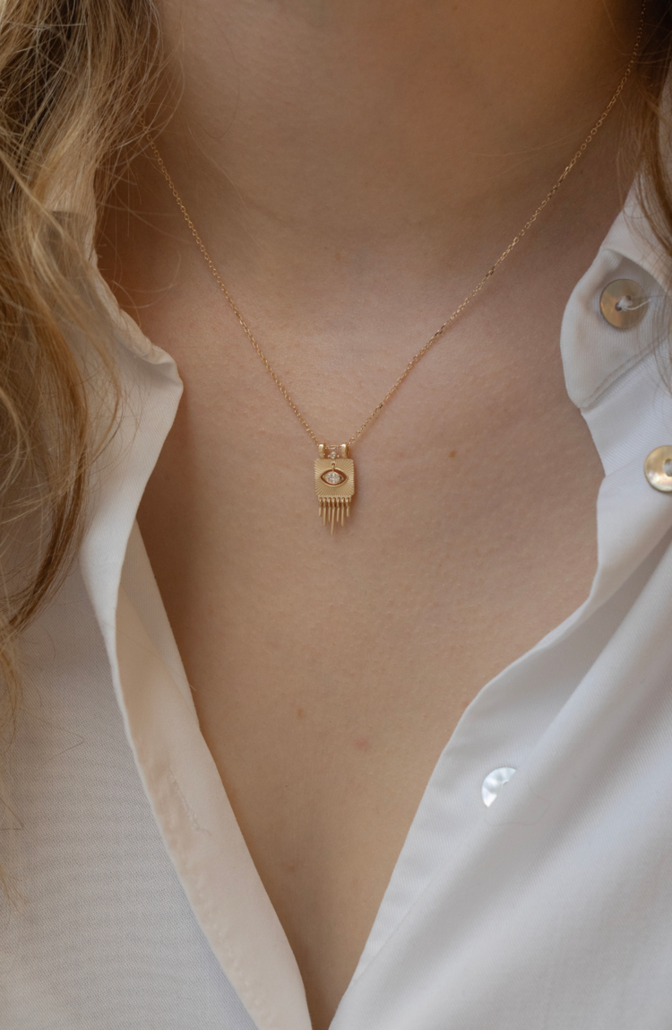 Celine d'Aoust Small solid gold plate with sunbeams & dangling eye diamond necklace