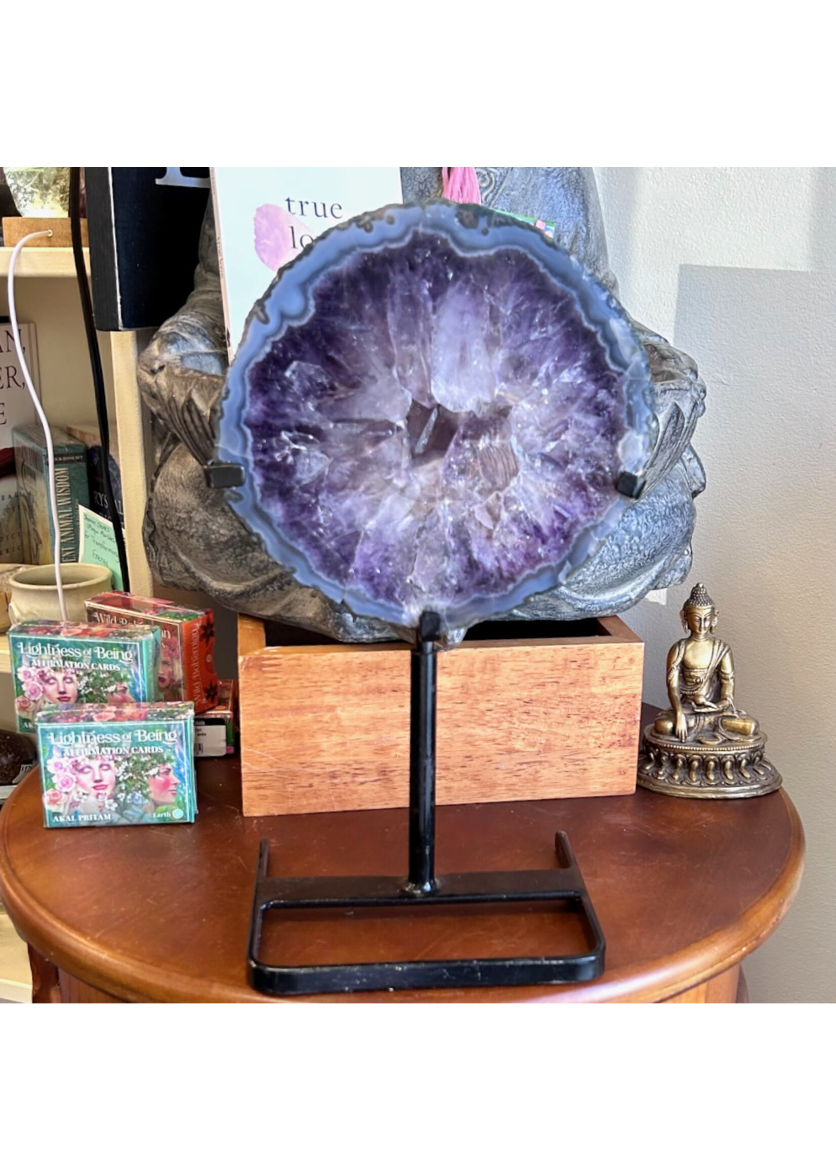 Amethyst Geode Portal Slice on stand for crossing dimensions