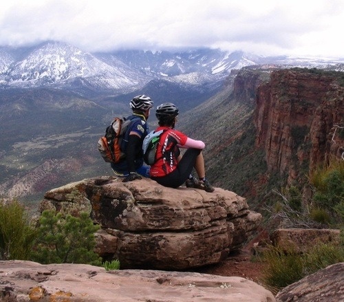 Couple sitting in mountains