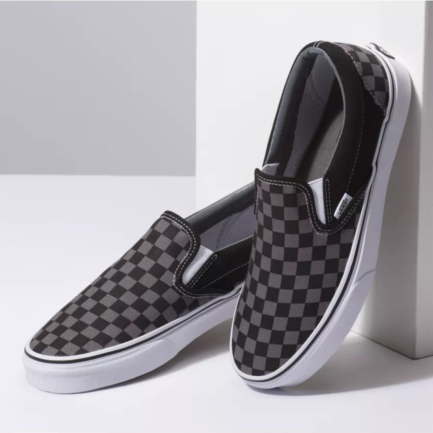 vans black and pewter slip on