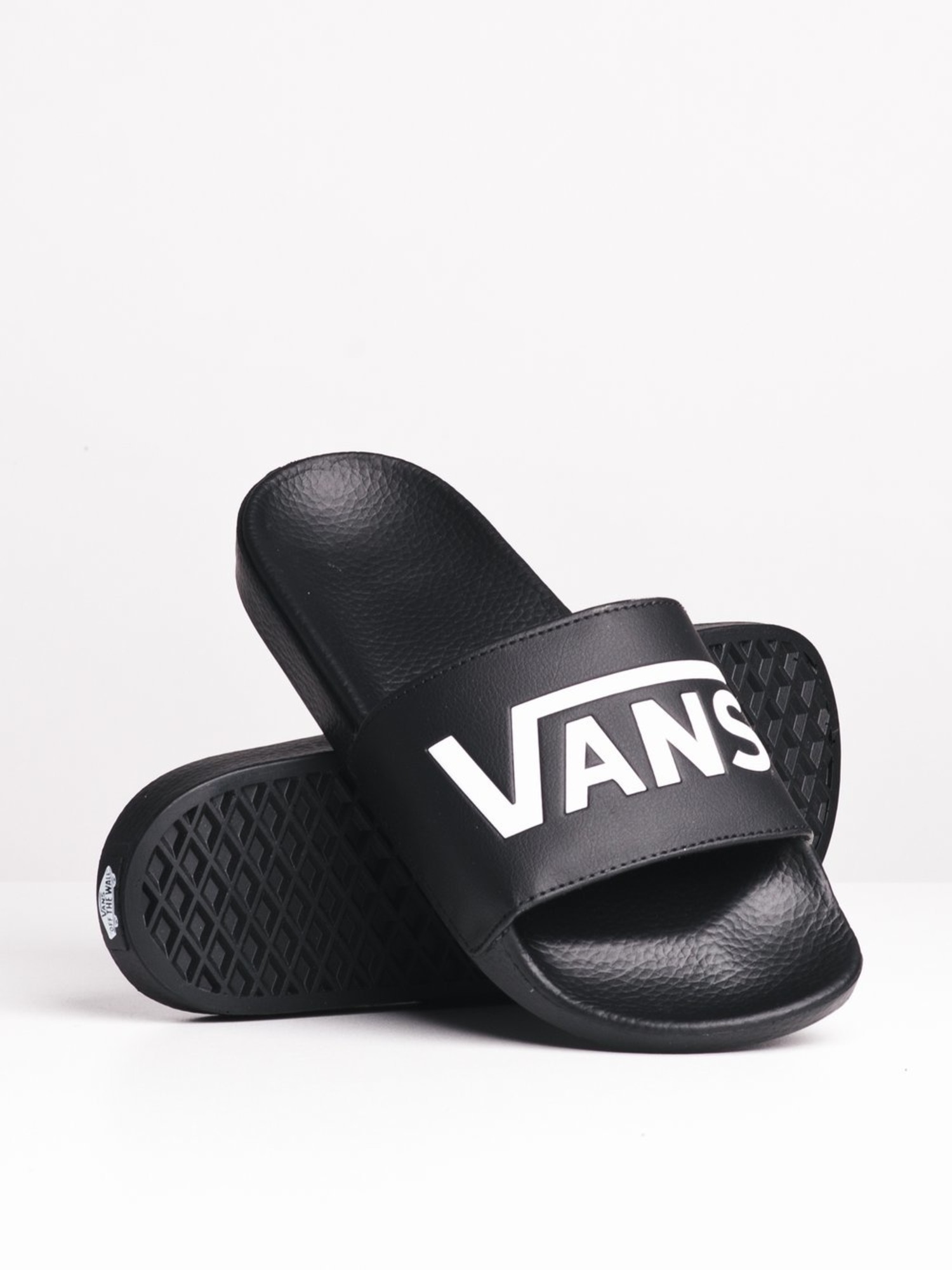 slide on vans black