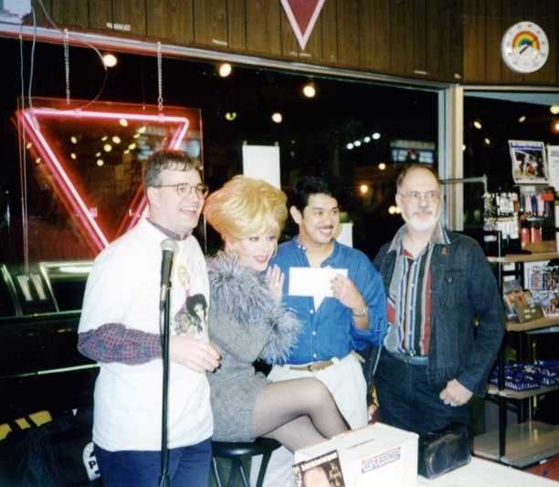 Frank Marino reading from his biography at a special Grand Re-opening celebration