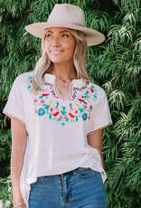 Wink Embroidered Notch Neck Blouse