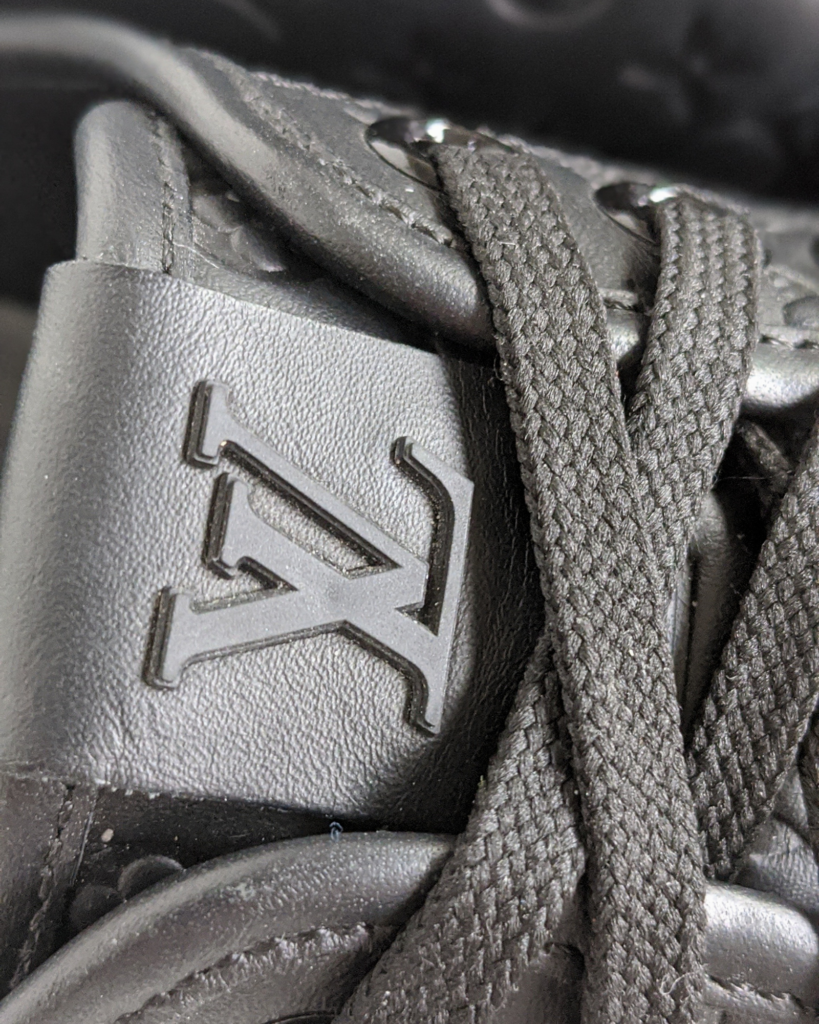 Louis Vuitton Black Monogram Embossed Calfskin Punchy Sneakers - 36 - RETYCHE
