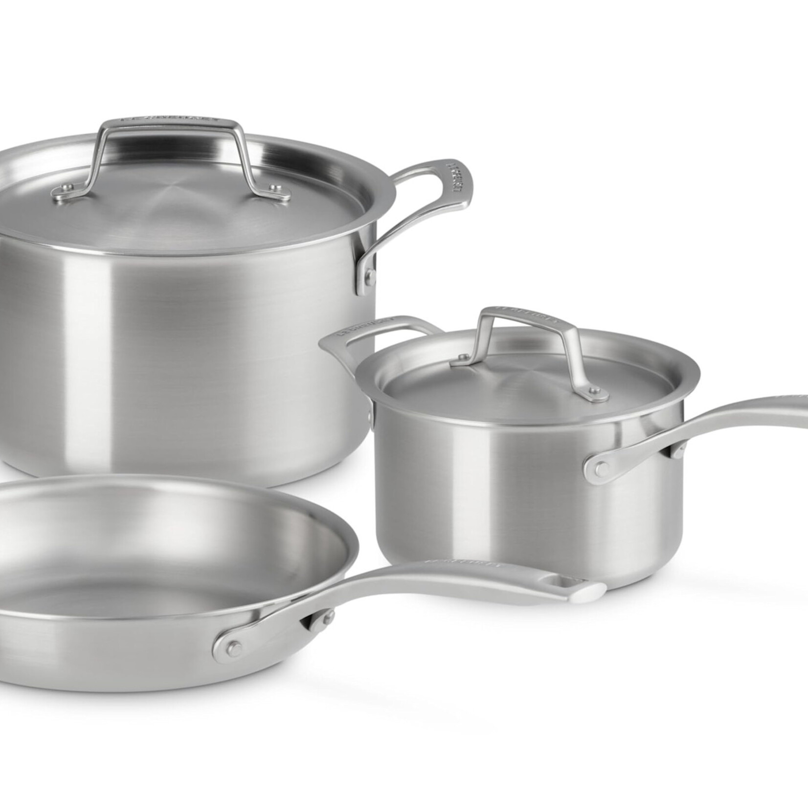 Le Creuset 5 Piece Set Essential Stainless Steel (9.5 in. Frying Pan, 3 qt. Saucepan with Lid, 4 qt. Stockpot with Lid) | Le Creuset