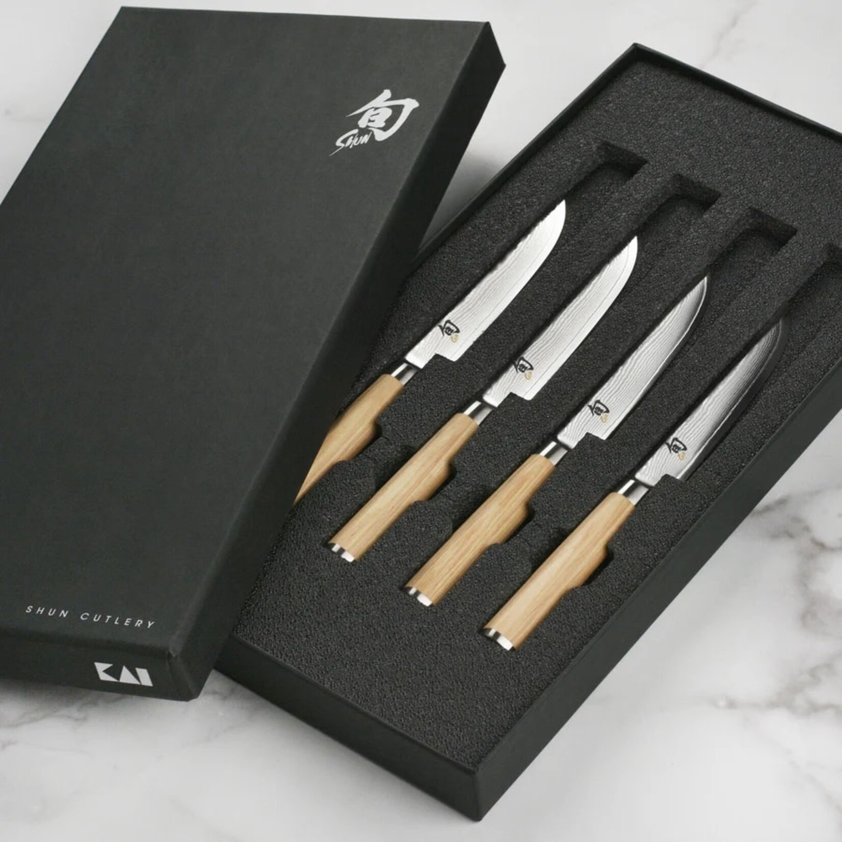 Shun Classic Blonde 4 Pc Steak Knife Set: Four Steak Knives (DM0711W) in a boxed set.