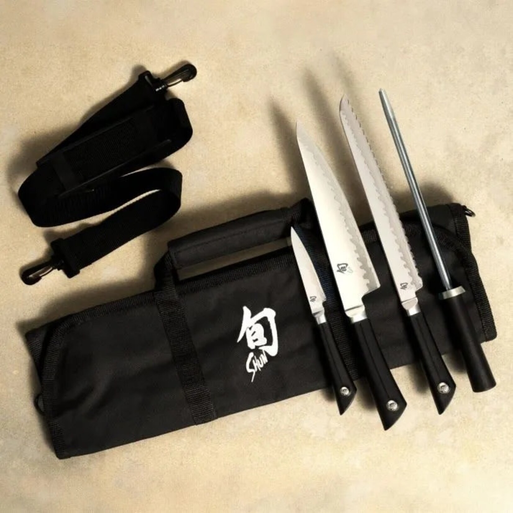 Shun Sora 5 Pc Student Set: Paring 3.5", Chef's 8", Bread 9", Combination Honing Steel, 8-slot Knife Roll (DM0880).