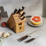 Shun Premier 8 Pc Professional Block Set: Paring 4", Santoku 5.5", Utility 6.5", Chef's 8", Bread 9", Slicing 9.5", Combination Honing Steel and 11-Slot Bamboo Block.