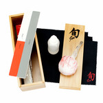Shun Knife Care Kit: Food-Grade Camilia Oil 2 oz., Rust Removal & Polishing Boards, Uchiko Powder Ball, Shun Polishing Cloths and User Instructions.