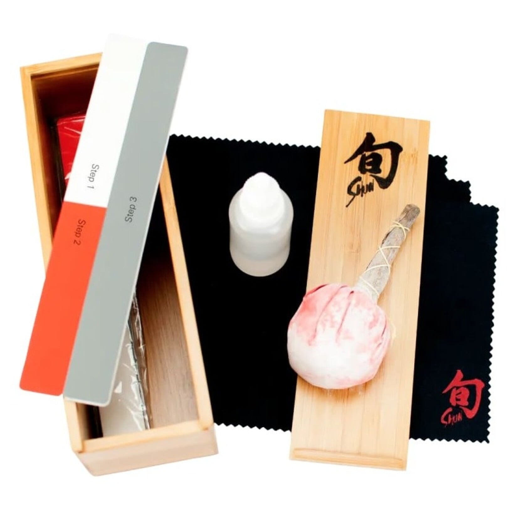 Shun Knife Care Kit: Food-Grade Camilia Oil 2 oz., Rust Removal & Polishing Boards, Uchiko Powder Ball, Shun Polishing Cloths and User Instructions.