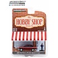 GREENLIGHT COLLECTIBLES GLC 97130-D 1989 FORD TAURUS WITH SALES ASSOCIATE IN SUIT THE HOBBY SHOP SERIES 13