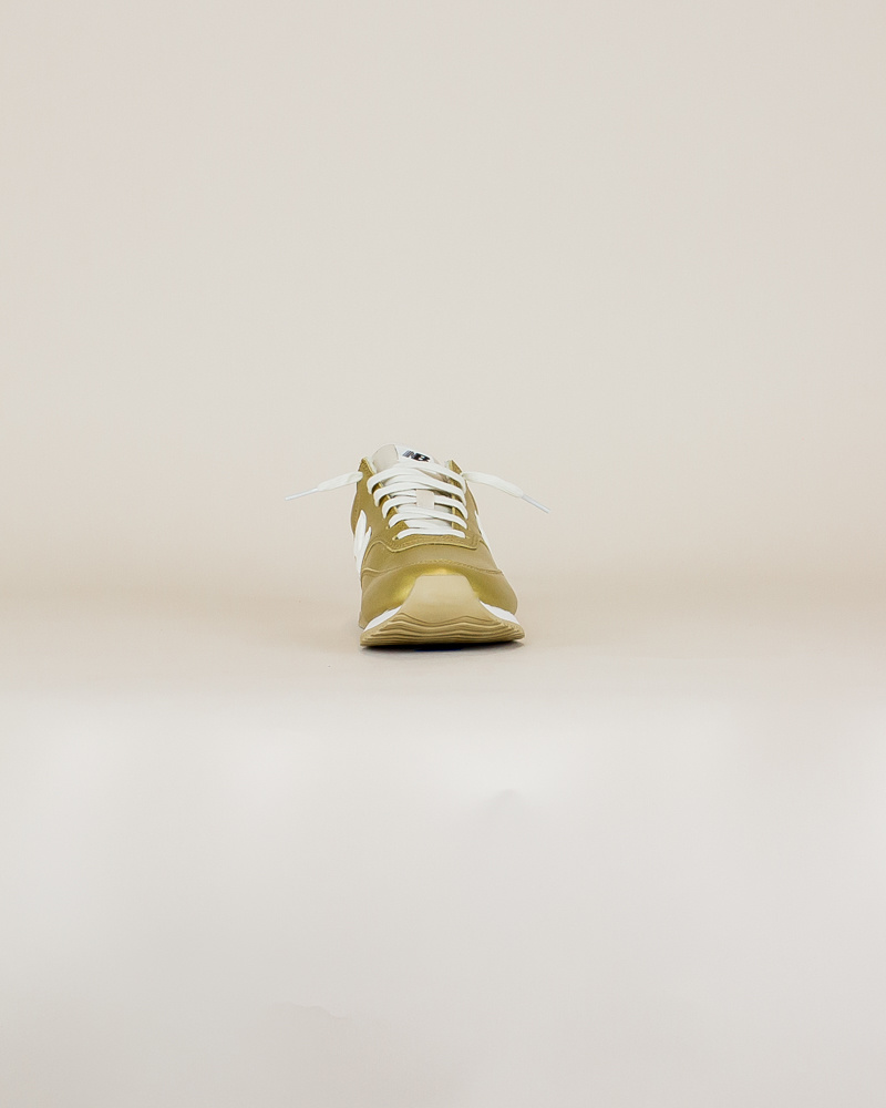 new balance 100 gold