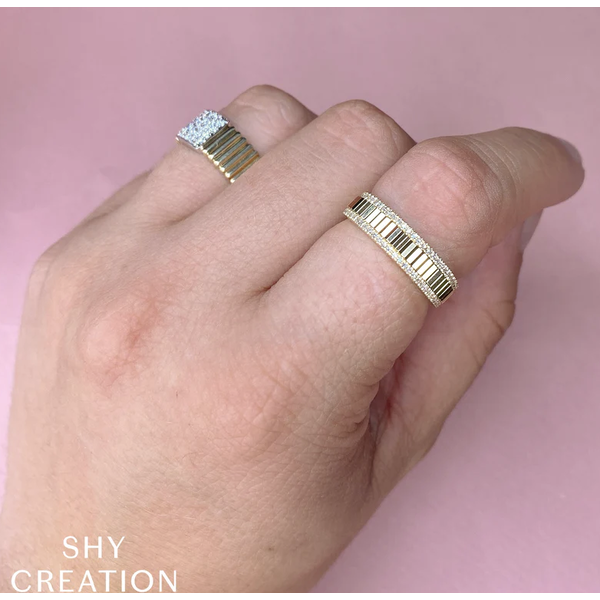 SHY CREATION INC 14ky .15 Diamond Ring