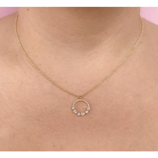 SHY CREATION INC 14ky .32 Diamond Pear Shape Circle Pendant