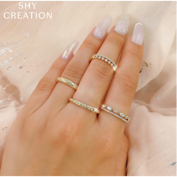 SHY CREATION INC 14ky .37 Diamond Pear Ring