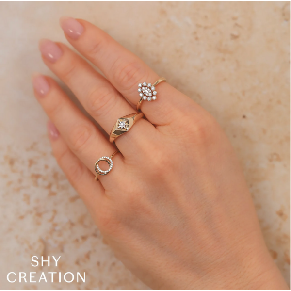 SHY CREATION INC 14ky .07ct Diamond Love Knot Circle Ring