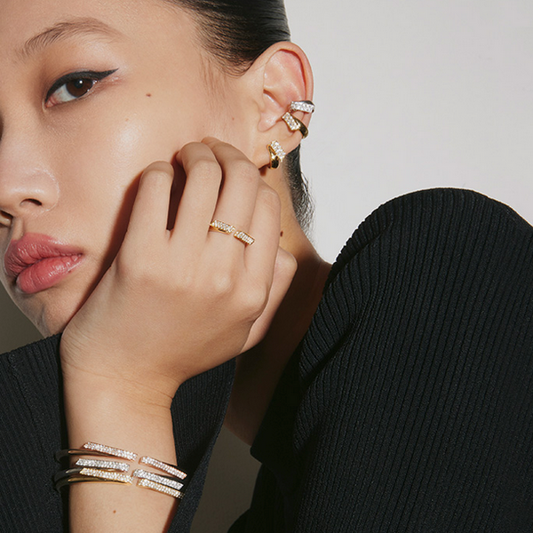 HEARTS ON FIRE LLC  18kt White Gold .58ct INSIDE/OUT Diamond Flexi Bangle