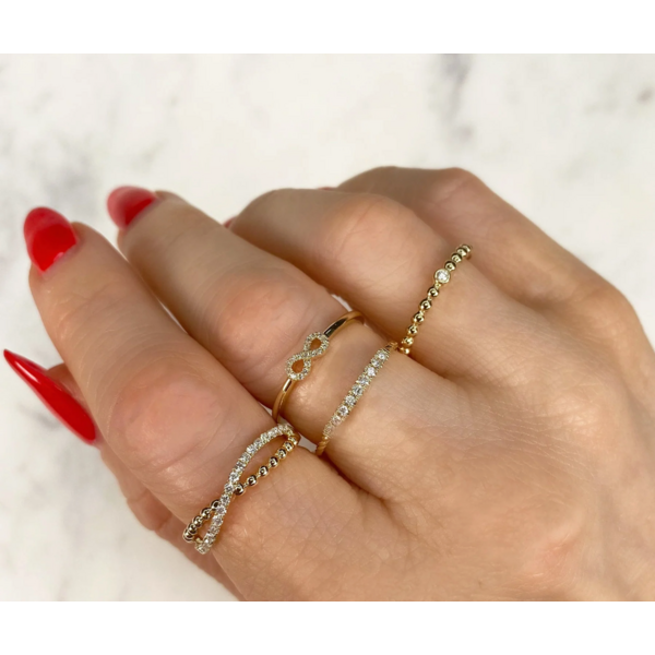 SHY CREATION INC SC22008830 - 14ky .04 Dia Infinity Ring