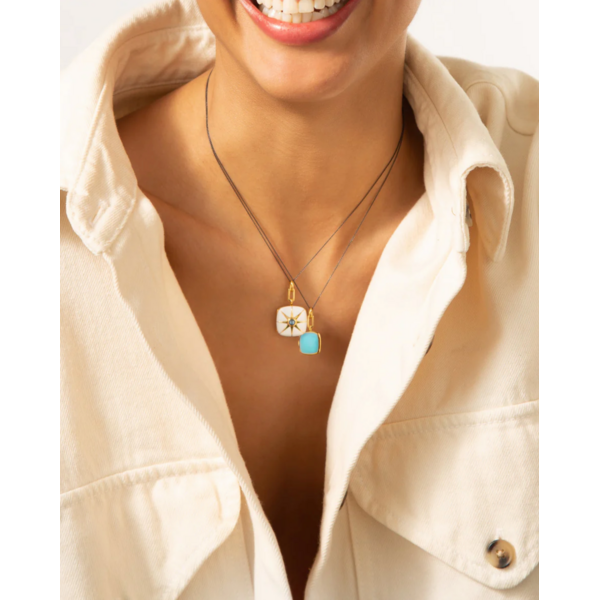 MONICA RICH KOSANN White Enamel Vermeil Cushion Locket with Blue Sapphire 18K Yellow Gold over Sterling Silver.