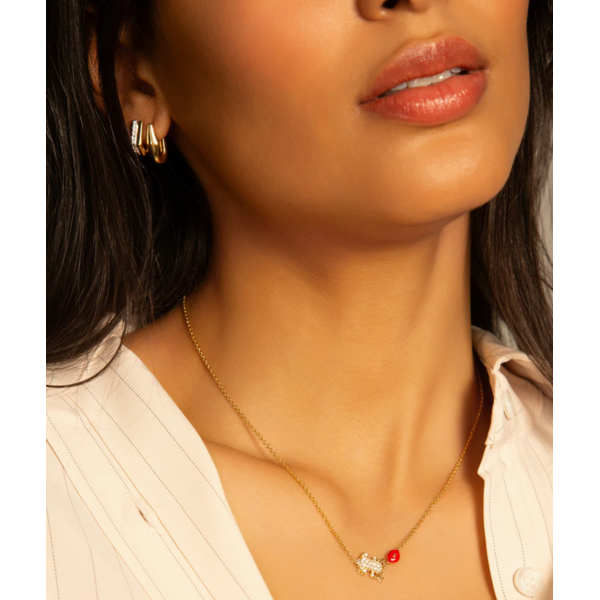 MONICA RICH KOSANN Two-Tone Infinity Huggie Earrings with White Sapphires in Sterling Silver and 18K Yellow Gold