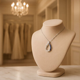 14kt White Gold .85 Sapphire .38 Diamond Pendant