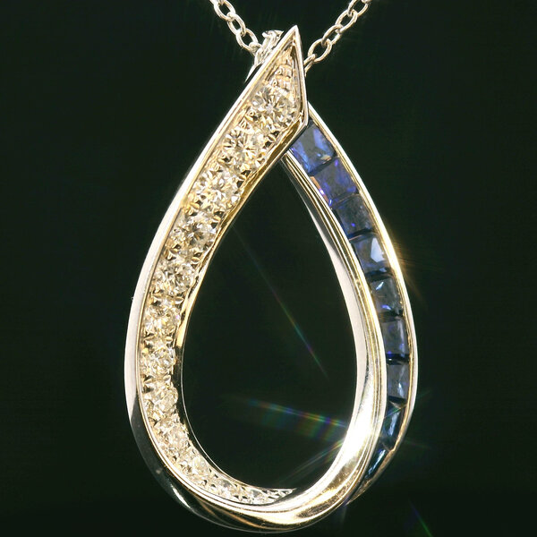 14kt White Gold .85 Sapphire .38 Diamond Pendant