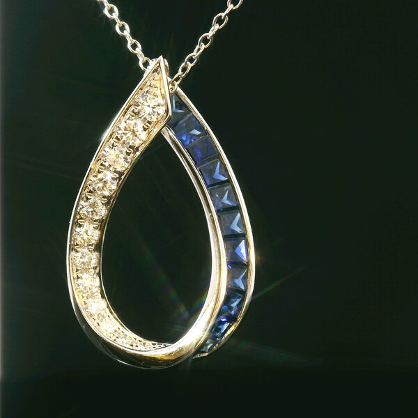 14kt White Gold .85 Sapphire .38 Diamond Pendant
